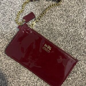 Coach Burgundy and Gold Clutch with Glossy Finish
